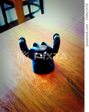 Cat-shaped paper holder, miniature interior decor, cute tabletop accessory. Cat-shaped paper holder, miniature interior decor, cute tabletop accessory. 140621478