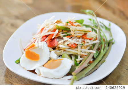 spicy salad, som tam or Thai spicy salad or papaya salad or vegetable salad spicy salad, som tam or Thai spicy salad or papaya salad or vegetable salad 140622929