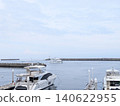 A view of ships anchored in the harbor in early summer. 140622955
