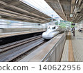 The bullet train speeds past. 140622956
