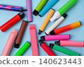Assorted colorful disposable vapes arranged on blue background. Top view. 140623443