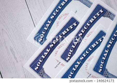 Social security number cards on white wooden background surface Social security number cards on white wooden background surface 140624173