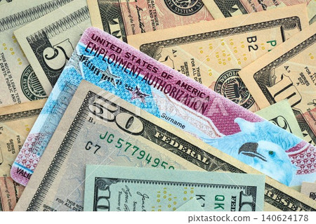 American US dollars money bills with employment authorization card American US dollars money bills with employment authorization card 140624178