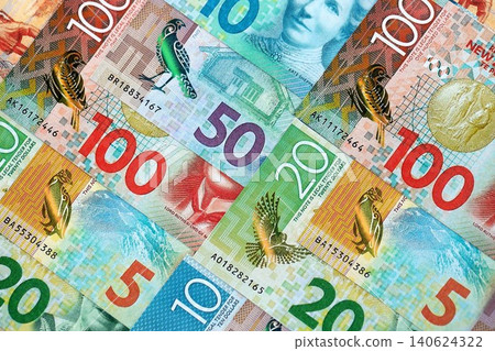 New Zealand dollar money bills in big amount on table close up. Rich life concept in New Zealand 140624322