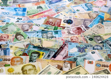 Many random banknotes of different currency. Big amount of random money bills Many random banknotes of different currency. Big amount of random money bills 140624428