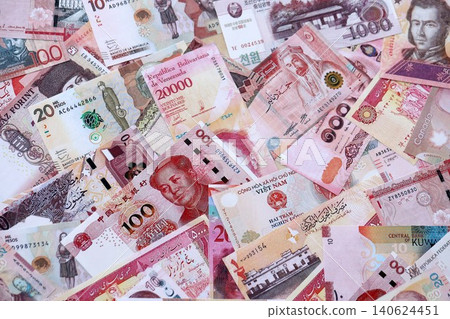 Various currencies money bills banknotes in red color. Many cash bills Various currencies money bills banknotes in red color. Many cash bills 140624451