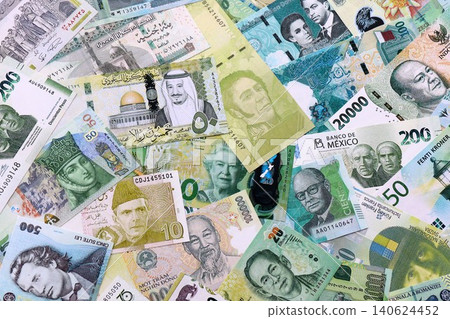Various currencies money bills banknotes in green color. Many cash bills 140624452