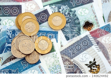 Coins and banknotes of Polish zloty and grosz currency. Poland PLN money close up. Business Coins and banknotes of Polish zloty and grosz currency. Poland PLN money close up. Business 140624492