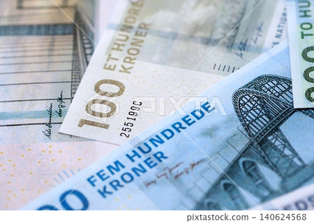 Danish krone paper banknotes pile on table. Denmark DKK currency money bills in big amount 140624568