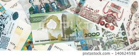 Algerian dinar paper banknotes pile on table. Algeria DZD currency money bills in big amount Algerian dinar paper banknotes pile on table. Algeria DZD currency money bills in big amount 140624598