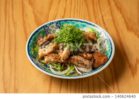 A basket of juicy and tender chicken neck meat, boldly grilled over charcoal. 140624640