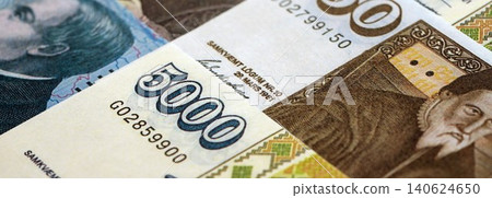 Icelandic krona money bills pile on table. Iceland banknotes of ISK currency close up Icelandic krona money bills pile on table. Iceland banknotes of ISK currency close up 140624650