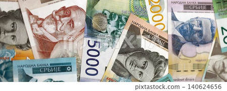Serbian dinar money bills pile on table. Serbia banknotes of RSD currency. Concept of business Serbian dinar money bills pile on table. Serbia banknotes of RSD currency. Concept of business 140624656