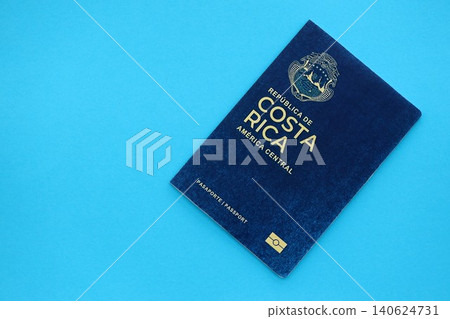 Costa Rican passport on table. Official identification document book for citizens of Costa Rica Costa Rican passport on table. Official identification document book for citizens of Costa Rica 140624731