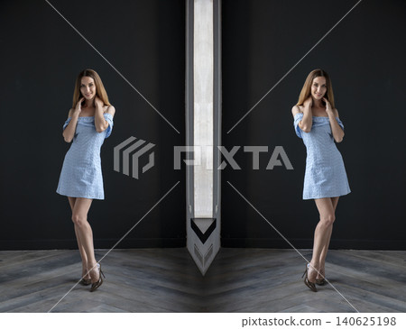 young beautiful woman on a dark background, full length studio shot 140625198