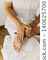 Close up of special foot massage therapy session. Female massage therapist's hands. 140625700