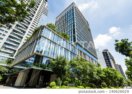 Low-angle view of the InterContinental, located beside the Calligraphy greenway of Taichung in Taiwan. Low-angle view of the InterContinental, located beside the Calligraphy greenway of Taichung in Taiwan. 140626029