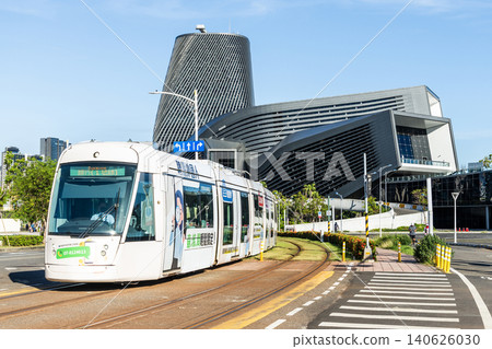 The circular light rail train drives past the Kaohsiung Port Cruise Terminal station in Taiwan. The circular light rail train drives past the Kaohsiung Port Cruise Terminal station in Taiwan. 140626030