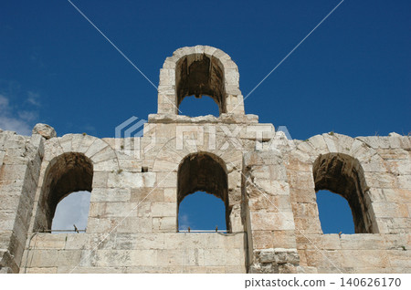 Arched openings of Odeon of Herodes Atticus stone ruins Athens Greece 140626170