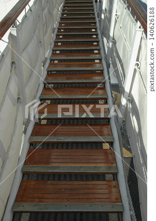 Wooden gangway leading up to a ship or boat Wooden gangway leading up to a ship or boat 140626188