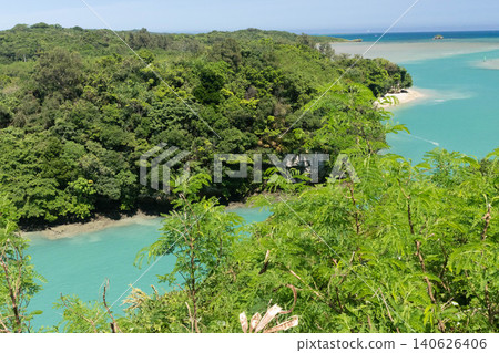 A breathtaking view of Okinawa! The emerald green sea and forest seen from the Yakena Strait Observatory. 140626406