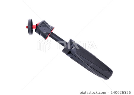 small extendable tripod with a tilted ball head and a clamping plastic screw small extendable tripod with a tilted ball head and a clamping plastic screw 140626536