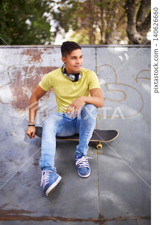 Fashion, thinking and man with skateboard in skate park for exercise, training and skating in city. Skater, fitness and person in trendy, casual and street style for sports, fun hobby and relax Fashion, thinking and man with skateboard in skate park for exercise, training and skating in city. Skater, fitness and person in trendy, casual and street style for sports, fun hobby and relax 140626660