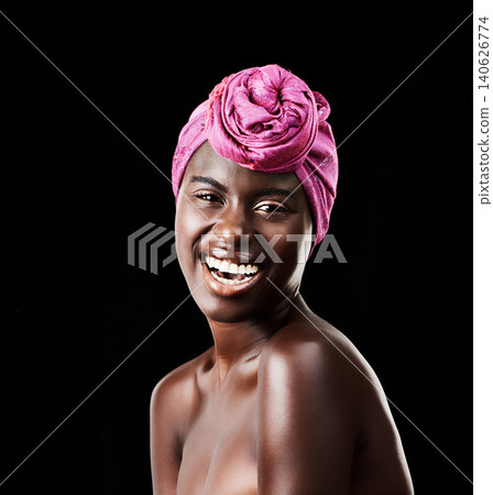Black woman, head wrap and beauty portrait with laugh, skincare and natural cosmetics in studio. Traditional, turban and African fashion with wellness and skin glow with makeup and dark background Black woman, head wrap and beauty portrait with laugh, skincare and natural cosmetics in studio. Traditional, turban and African fashion with wellness and skin glow with makeup and dark background 140626774