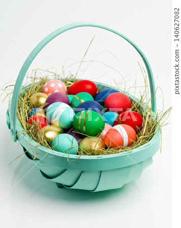 Easter, basket and eggs for chocolate holiday with dessert snacks for traditional present, festive season or white background. Decoration, mockup space and studio with shell pattern, nest or giving Easter, basket and eggs for chocolate holiday with dessert snacks for traditional present, festive season or white background. Decoration, mockup space and studio with shell pattern, nest or giving 140627082