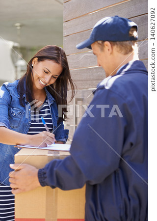 Woman, smile and signature for package, delivery and shipping order with paperwork and parcel. Moving box, sign and courier with document, form and service of distribution worker with customer 140627092