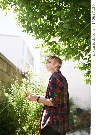 Woman, tree and thinking in garden by home for summer morning, fresh air or planning for day. Relax, nature and thoughtful female person in backyard for peace, idea or wondering in environment Woman, tree and thinking in garden by home for summer morning, fresh air or planning for day. Relax, nature and thoughtful female person in backyard for peace, idea or wondering in environment 140627120