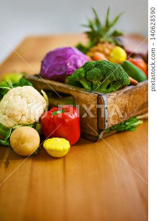 Table, crate and fresh or organic vegetables for nutrition or wellbeing, ripe and raw ingredients for sustainability or eating. Agriculture, produce and healthy diet for vegan, wellness and protein. Table, crate and fresh or organic vegetables for nutrition or wellbeing, ripe and raw ingredients for sustainability or eating. Agriculture, produce and healthy diet for vegan, wellness and protein. 140628590