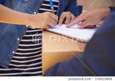 Woman, hands and signature for package, delivery and shipping order with paperwork and parcel. Cardboard box, sign and courier with document, form and service of distribution worker with customer 140628668