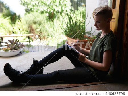 Woman, home or writing notes on floor on book for remote work, schedule or information by garden. Pen, notepad or student with creative ideas, learning or planning to do list on journal for education Woman, home or writing notes on floor on book for remote work, schedule or information by garden. Pen, notepad or student with creative ideas, learning or planning to do list on journal for education 140628798
