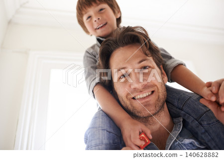 Father with son on his shoulders, portrait and home with smile and love with single parent and bonding together. Family, dad carrying boy and childhood with fun and playing with joy and happiness Father with son on his shoulders, portrait and home with smile and love with single parent and bonding together. Family, dad carrying boy and childhood with fun and playing with joy and happiness 140628882