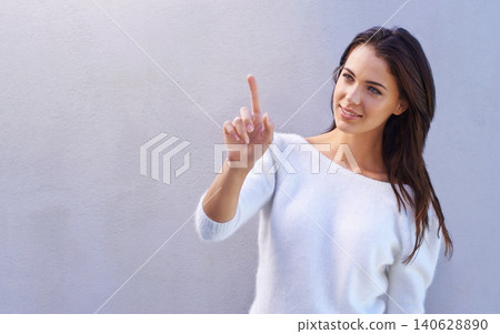 Fashion, smile and pointing for happy woman, advertising and mockup space on studio background. Product, placement and gesture to marketing or sales, promotion or announcement by female model Fashion, smile and pointing for happy woman, advertising and mockup space on studio background. Product, placement and gesture to marketing or sales, promotion or announcement by female model 140628890