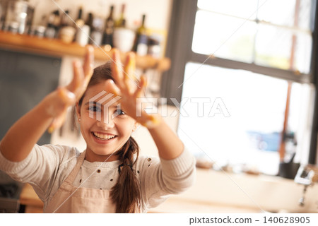 Girl, portrait and hands for baking in kitchen, pastry and happy for food preparation in home. Female person, kid and smile for learning in home, child development and education for skills or cake Girl, portrait and hands for baking in kitchen, pastry and happy for food preparation in home. Female person, kid and smile for learning in home, child development and education for skills or cake 140628905
