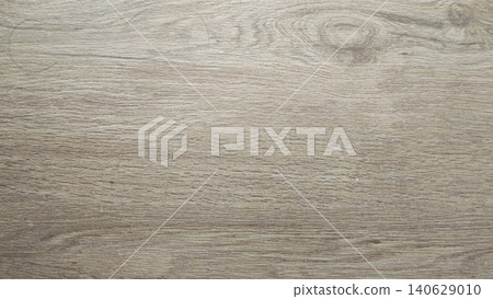 Light brown wood look ceramic tile flooring texture background Light brown wood look ceramic tile flooring texture background 140629010