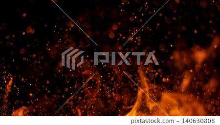 Burning orange flames with glowing embers isolated on black background. Realistic fire effect suitable for visual effects, compositing, motion graphics and video editing. Burning orange flames with glowing embers isolated on black background. Realistic fire effect suitable for visual effects, compositing, motion graphics and video editing. 140630808