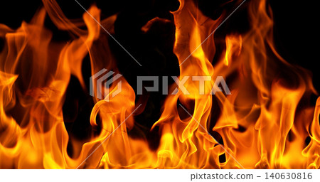 Burning orange flames with glowing embers isolated on black background. Realistic fire effect suitable for visual effects, compositing, motion graphics and video editing. Burning orange flames with glowing embers isolated on black background. Realistic fire effect suitable for visual effects, compositing, motion graphics and video editing. 140630816
