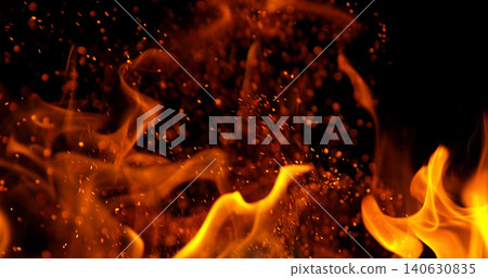 Burning orange flames with glowing embers isolated on black background. Realistic fire effect suitable for visual effects, compositing, motion graphics and video editing. Burning orange flames with glowing embers isolated on black background. Realistic fire effect suitable for visual effects, compositing, motion graphics and video editing. 140630835