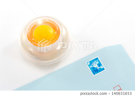 Put a stamp on the envelope. Put a stamp on the envelope. 140631653