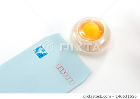 Put a stamp on the envelope. Put a stamp on the envelope. 140631656