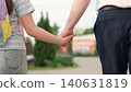 hold textbook hand, happy family, kid child carries school textbook hand, man father leads student backpack by hand, first-graders school backpacks walk with dad park, child with school backpacks 140631819