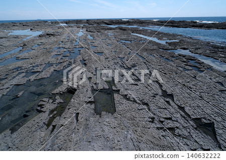 The rocky shores of Shihara Beach offer interesting shapes. The rocky shores of Shihara Beach offer interesting shapes. 140632222