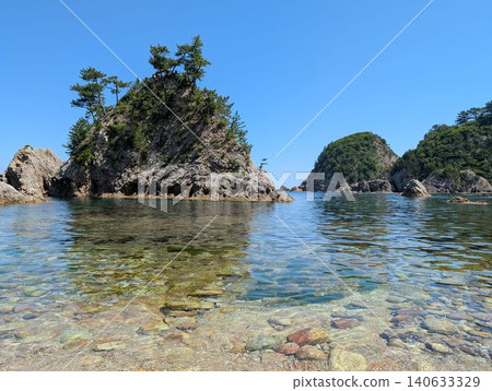 The emerald green shallows boast exceptional clarity, and the small islands are lush with new greenery. The emerald green shallows boast exceptional clarity, and the small islands are lush with new greenery. 140633329