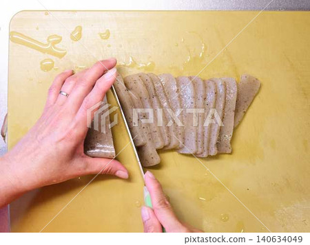 Preparing oden: Konjac (a type of jelly made from konjac root) Preparing oden: Konjac (a type of jelly made from konjac root) 140634049
