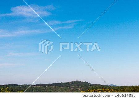 The refreshing contrast between the clear blue sky and the lush green mountains. The refreshing contrast between the clear blue sky and the lush green mountains. 140634885