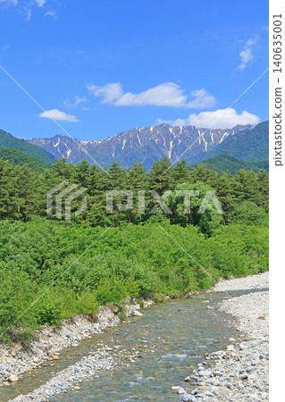The Northern Alps' Ushirotateyama mountain range under clear skies during the rainy season. The Northern Alps' Ushirotateyama mountain range under clear skies during the rainy season. 140635001