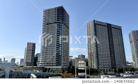 The cluster of high-rise apartment buildings in Ariake, Koto Ward, Tokyo, and the blue sky. The cluster of high-rise apartment buildings in Ariake, Koto Ward, Tokyo, and the blue sky. 140635602